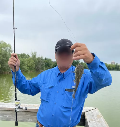 Fisherman at Swan Lake