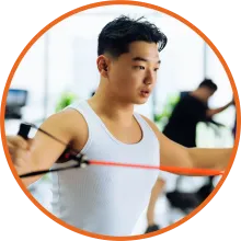 Person exercising in a gym.