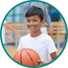 Child holding a basketball