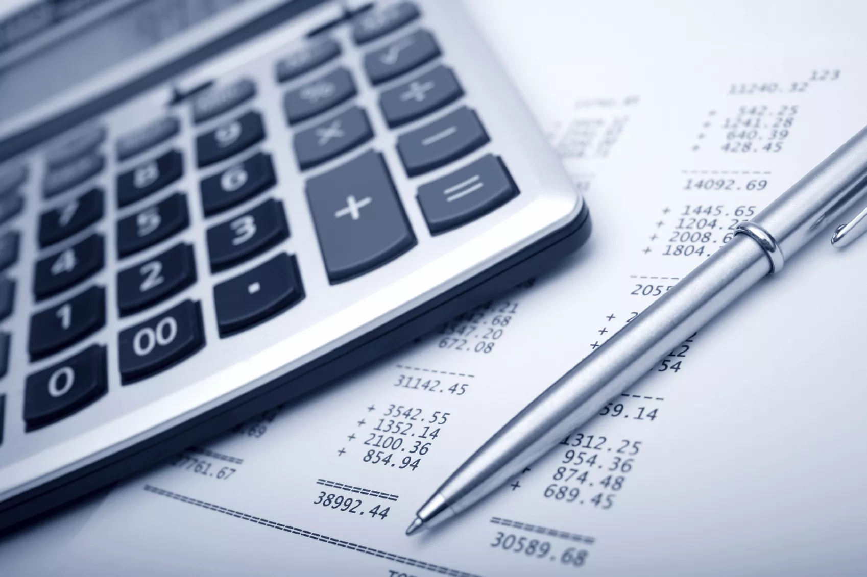 image of calculator pen and paper