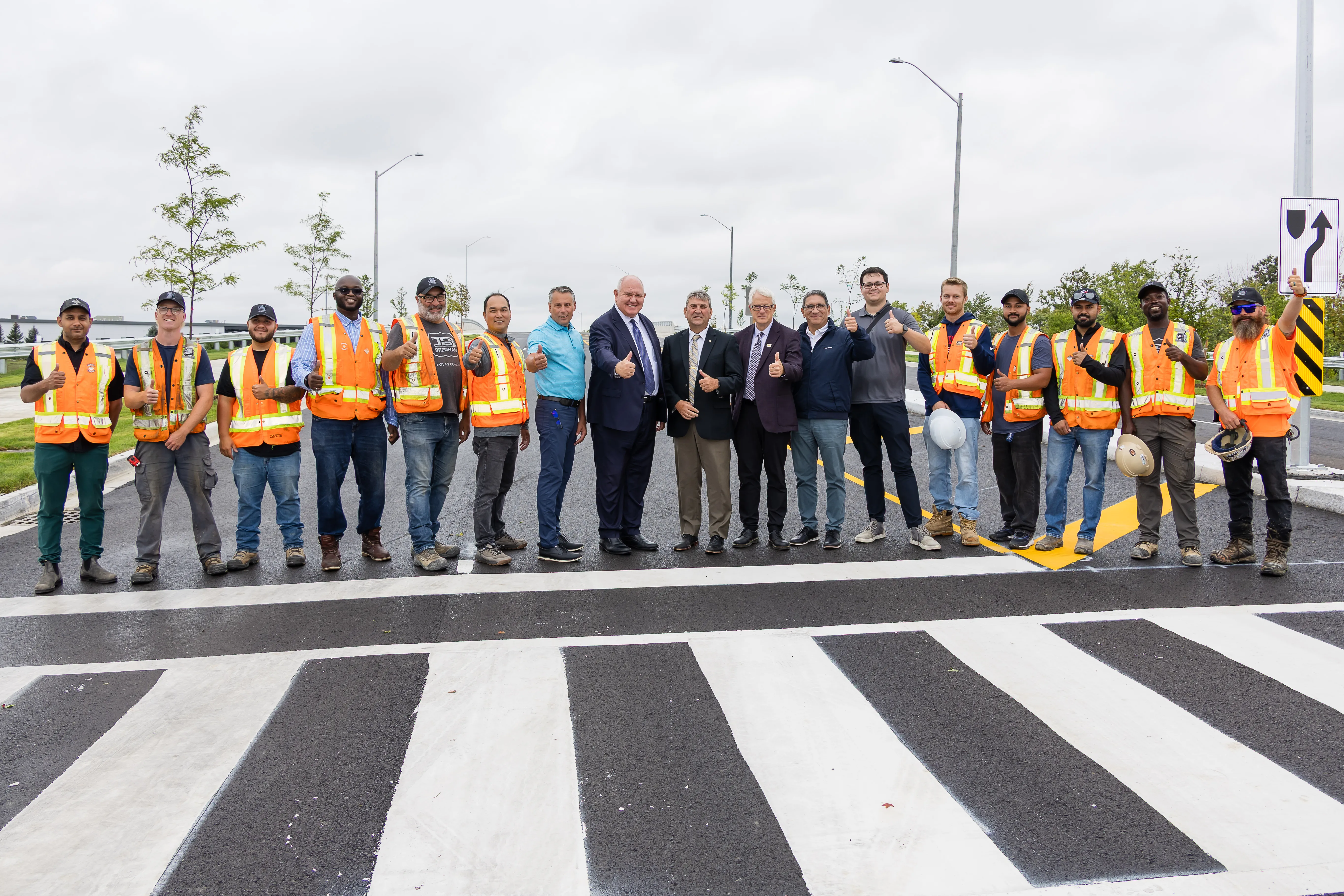 Picture of Markham, Richmond Hill Mayor and workers at the Highway 404 Mid-Block Crossing