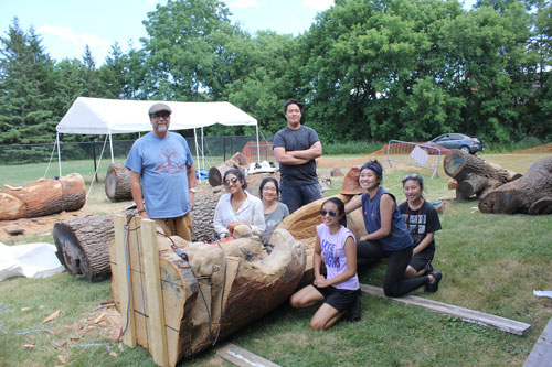 Indigenous Throne 1 Donald Chrétien, Indigenous consulting artist with six grade 12 Unionville High School students at the Markham Museum grounds.